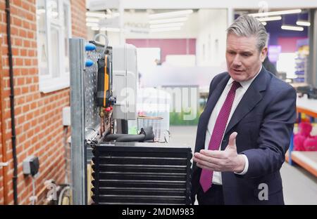 Labour party leader Sir Keir Starmer inspects a heat pump demonstrator during a visit to renewable energy company, Octopus Energy, in Slough, East Berkshire, as the Party sets out plans to support households and businesses with rising energy bills. Picture date: Monday January 23, 2023. Stock Photo