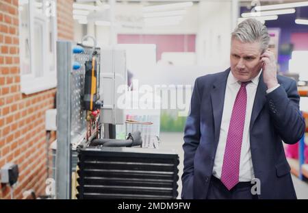 Labour party leader Sir Keir Starmer inspects a heat pump demonstrator during a visit to renewable energy company, Octopus Energy, in Slough, East Berkshire, as the Party sets out plans to support households and businesses with rising energy bills. Picture date: Monday January 23, 2023. Stock Photo