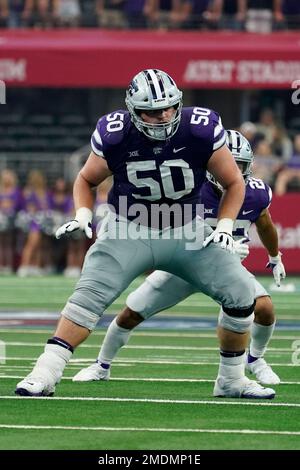 Kansas State offensive lineman Cooper Beebe (50) defends during an NCAA ...