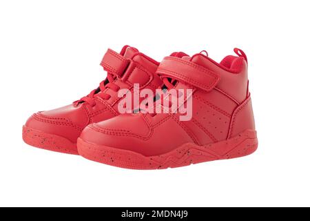 Red kids shoes. Sport sneakers isolated on white background Stock Photo