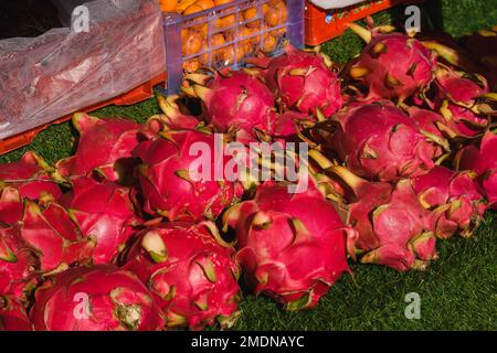 Group of pitaya or dragon fruit for sale in street market, Ko Lanta, Krabi, Thailand. Stock Photo
