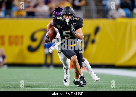 Appalachian State wide receiver Thomas Hennigan (5) runs away from