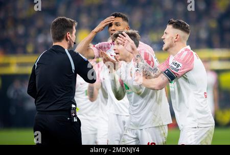 Dortmund, Germany. 22nd Jan, 2023.  Schiedsrichter Frank Willenborg , Felix Uduokhai (FCA) Elvis Rexhbecaj , Jeffrey Gouweleeuw (FCA) Borussia Dortmun Stock Photo