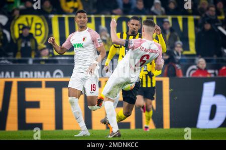 Dortmund, Germany. 22nd Jan, 2023.  Felix Uduokhai (FCA), Jeffrey Gouweleeuw (FCA), Sebastien Haller (BVB) Borussia Dortmund - FC Augsburg Bundesliga Stock Photo