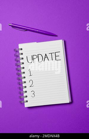 Text sign showing Update. Business photo showcasing make something more ...