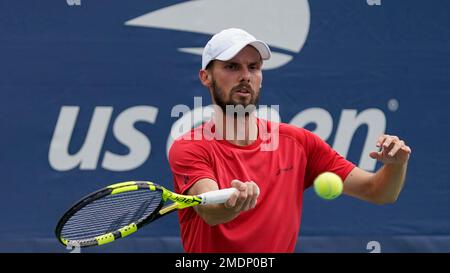 Oscar Otte of Germany returns a shot against Matteo