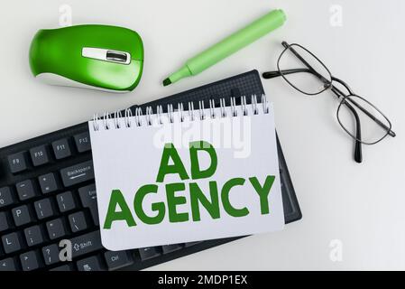 Sign displaying Ad Agency. Business overview business dedicated to creating planning and handling advertising Stock Photo