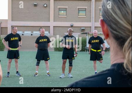 Maj. Gen. Michel M. Russell, Sr., commanding general of the 1st Theater Sustainment Command, motivates civilian and military leaders before an early morning run as part of the USARCENT Commander’s Conference (ACC) at Camp Arifjan, Kuwait, 26 July, 2022.  The USARCENT Commander's Conference was hosted by Lt. Gen. Patrick Frank and Command Sgt. Maj. Jacinto Garza, where various topics were covered regarding Security Cooperation, Partnership Development, and Key Leadership Engagements. Stock Photo