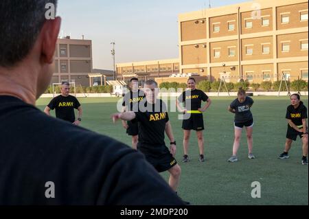 U.S. Army Central Commanding General, Lt. Gen. Patrick Frank motivates civilian and military leaders before an early morning run as part of the USARCENT Commander’s Conference (ACC) at Camp Arifjan, Kuwait, 26 July, 2022.  The USARCENT Commander's Conference was hosted by Lt. Gen. Patrick Frank and Command Sgt. Maj. Jacinto Garza, where various topics were covered regarding Security Cooperation, Partnership Development, and Key Leadership Engagements. Stock Photo