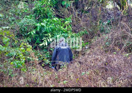 Glasgow, Scotland, UK 23rdJanuary, 2023. Van crashes through sports field wire and into the side of the forth and clyde canal at Blairdardie on great western road. The torn up wire wall and concrete posts were intersected by train tracks in the soft football pitch credit  Gerard Ferry/Alamy Live News Stock Photo