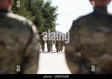 Colonel Nicholas Dipoma, Second Air Force Vice Commander, and Chief Master Sergeant Kathleen McCool, Second Air Force Command Chief, visit the 37th Training Wing at Joint Base San Antonio-Lackland, Texas, on July 26, 2022. Col. Dipoma and CMSgt. McCool toured Basic Military Training. Stock Photo