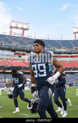 Tennessee Titans linebacker Rashad Weaver (99) comes off the