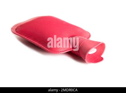 Red medical heating pad with hot water on a white background, isolate. Close-up Stock Photo