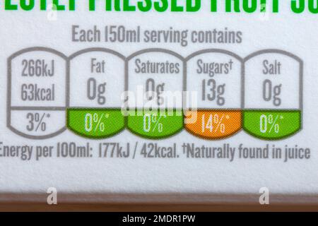 Nutritional information traffic lights system labelling colour coded label information on carton of Tropicana Orange with extra juicy bits juice drink Stock Photo