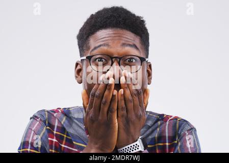 Na dude, cant be. Studio portrait of a handsome young man looking surprised against a grey background. Stock Photo