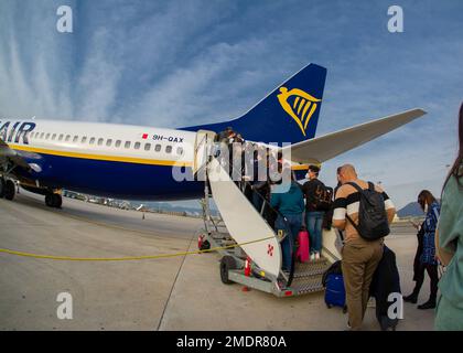April 24 2022- Naples Italy Travellers board the RyanaIr plane to take off to their destination Stock Photo