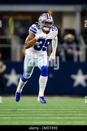 Seattle Seahawks wide receiver Dee Eskridge (1) lands outside the end zone  after catching a pass under pressure from Dallas Cowboys safety Tyler  Coyle, right, in the first half of a preseason