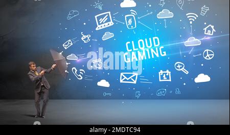 Businessman defending with umbrella, modern technology concept Stock Photo