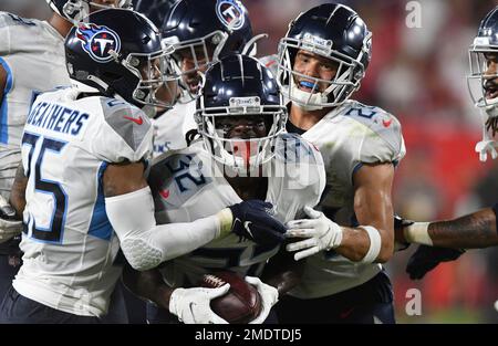 Tennessee Titans Jamal Carter 32 celebrates with teammates