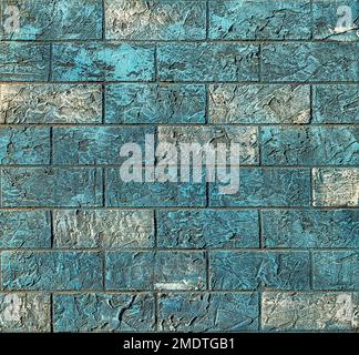 Texture of a wall covered with decorative brick-like tiles. Abstract background for design. Stock Photo