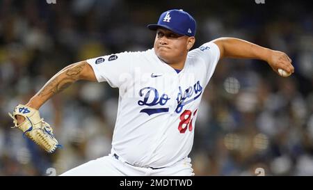 Los Angeles Dodgers pitcher Victor Gonzalez throws in the bullpen during  the sixth inning of a spring training baseball game against the Seattle  Mariners Saturday, March 19, 2022, in Peoria, Ariz. (AP