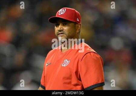 Washington Nationals manager Dave Martinez walks back to the dugout after a  pitching change during a baseball game against the Atlanta Braves early  Saturday, Aug. 14, 2021, in Washington. (AP Photo/Nick Wass