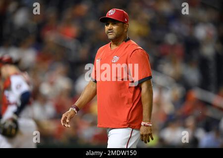 Washington Nationals manager Dave Martinez walks back to the dugout after a  pitching change during a baseball game against the Atlanta Braves early  Saturday, Aug. 14, 2021, in Washington. (AP Photo/Nick Wass