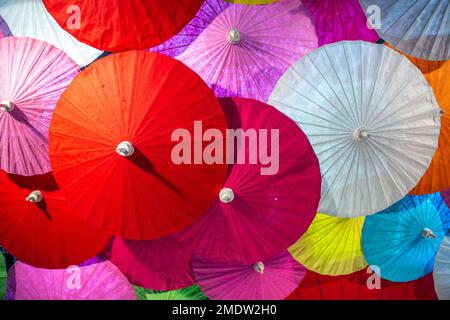 colorful paper umbrella handcraft work popular art in Chiang Mai Bo sang village tourist travel landmark Stock Photo