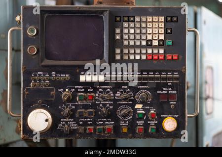 old lathe machine manual control panel with many button switch for metal CNC production data Stock Photo