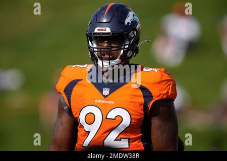 Denver Broncos defensive lineman Jonathan Harris (92) plays against the  Tennessee Titans during the first half of an NFL football game Sunday, Nov.  13, 2022, in Nashville, Tenn. (AP Photo/Mark Zaleski Stock