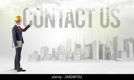 Young businessman with hard hat Stock Photo