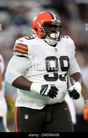 Cleveland Browns defensive tackle Andrew Billings warms up before an NFL  football game against the New York Giants, Sunday, Aug. 22, 2021, in  Cleveland. The Browns won 17-13. (AP Photo/David Dermer Stock