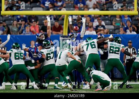 New York Jets kicker Chris Naggar, right, celebrates with offensive guard  Dan Feeney (67) after kicking a field goal in the first half of an NFL  preseason football game against the New