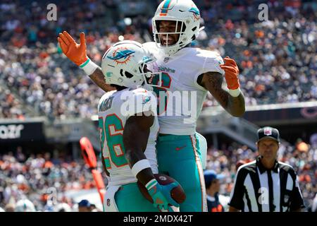 HOUSTON, TX - AUGUST 19: Miami Dolphins running back Salvon Ahmed (26)  carries the ball in the