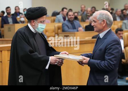 Tehran, Tehran, Iran. 23rd Jan, 2023. A handout photo made available by the Iranian presidential office shows, Iranian president EBRAHIM RAISI (L) attends during the 28th Razi research festival on medical sciences with the goal of identifying capacities and honoring exemplary researchers in the healthcare sector. Credit: ZUMA Press, Inc./Alamy Live News Stock Photo