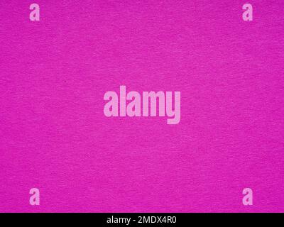 Fuchsia, hot pink color matte paper texture, abstract background. Blank page sheet decor. Background for handcrafts, 3d, new year designs decoration Stock Photo