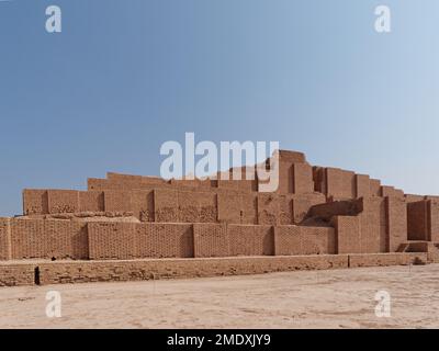 A beautiful shot of the historic Ziggurat of Chogha Zanbil under a blue sky in Khuzestan, Iran Stock Photo