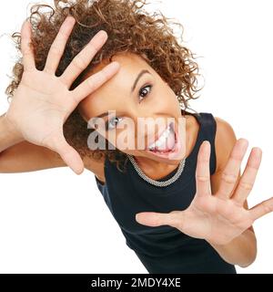 Shock, excited and portrait of a woman in a studio with a screaming, shouting and wow facial expression. Surprise, happy and female model from Mexico Stock Photo