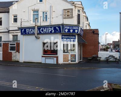 Blackpool Lancashire UK Jan 2023 traditional old fashioned seaside fish and chip shop Blackpool with blue signs Stock Photo