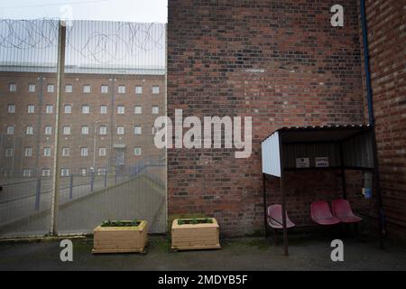 An exterior view of buildings within the precincts of HMP Liverpool, also known as Walton Prison. The prison was given a scathing report in 2017 which pointed out various failings and problems. Present governor Pia Sinha was appointed in that year and in the next two years she turned the prison around with a programme of improvements and support for inmates and infrastructure. HMP Liverpool houses a maximum of 700 prisoners with an overall staff of around 250. Stock Photo