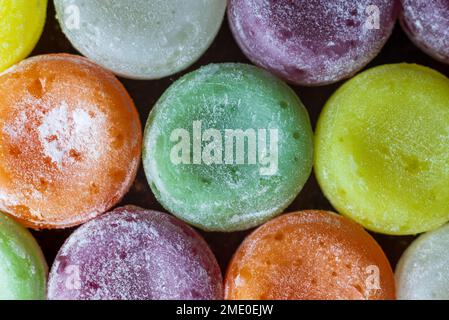 colorful sweet flavoured boiled sweets, candies, Candy on white, black background, hard candy Stock Photo