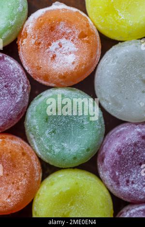 colorful sweet flavoured boiled sweets, candies, Candy on white, black background, hard candy Stock Photo