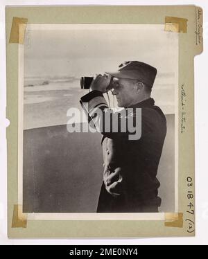 The Look-See. The Antarctic. The World of Ice. The Commander of Navy's Task Force 68, otherwise known at the Byrd Antarctic Expedition is Rear Admiral Richard N. Cruzen, of Gallatin, Missouri. Here he is shown aboard the Coast Guard's icebreaker NORTHWIND, studying the World of Ice. Stock Photo