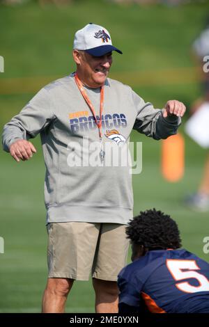 Denver, Colorado, USA. 7th Aug, 2021. Denver Broncos Head Coach VIC FANGIO,  center, looks on at his team as they stretch duringTraining Camp at UC  Health Training Center in Dove Valley Sat.