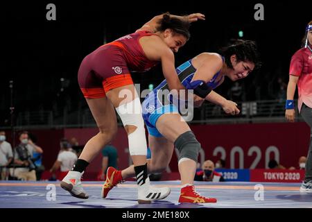 France's Kuomba Larroque, left, competes against Mongolia's Battsetseg ...