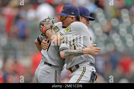 Milwaukee Brewers' Luis Urias (2) shakes hands with Rowdy Tellez before a  baseball game against the Los Angeles Dodgers Tuesday, Aug. 16, 2022, in  Milwaukee. (AP Photo/Aaron Gash Stock Photo - Alamy