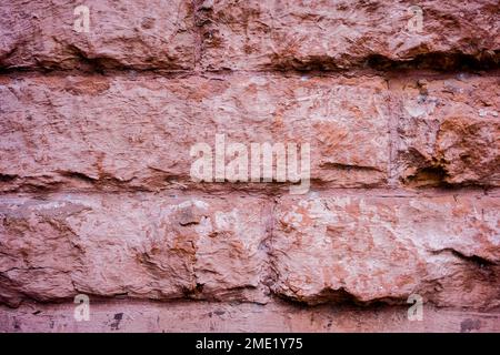 Old but solid brick wall in close up view displaying texture. Stock Photo