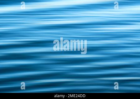 Abstract pattern formed by flowing water with slow shutter used to blur motion. Copy space. Backgrounds. No people. Stock Photo