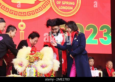 Mayor of Westminster Cllr Hamza Taouzzale joins in the Lions' Eye Dotting Ceremony as part of the Chinese New Year 2023 celebrations in London, UK Stock Photo