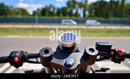 Handlebars and speedometer of motorbike Stock Photo